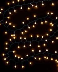 Christmas light string on a black background