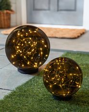 Outdoor solar-powered globe lights